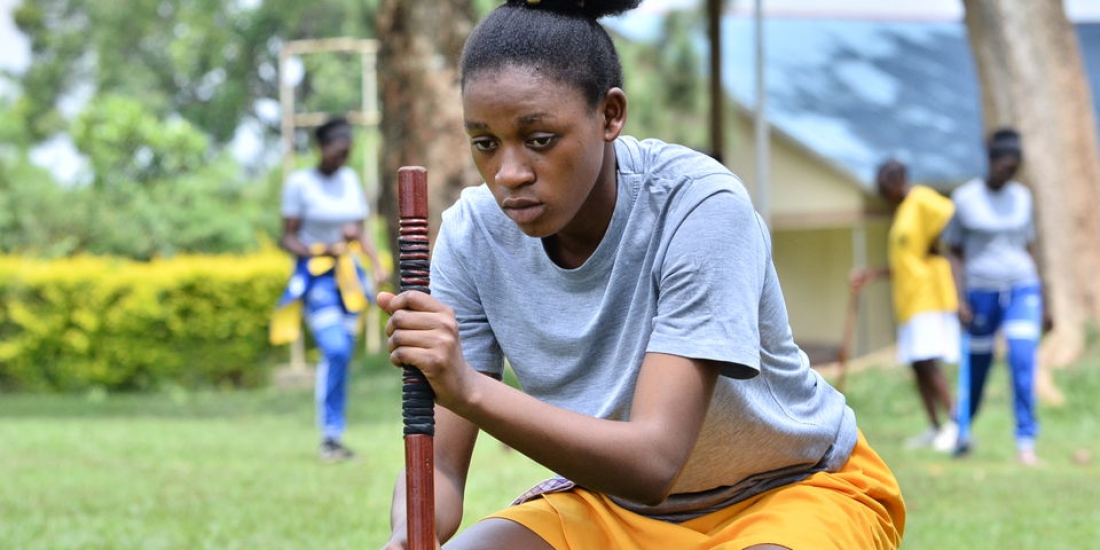 Priscilla Nansubuga of Mpoma School measures the right direction her ball should take through the gates